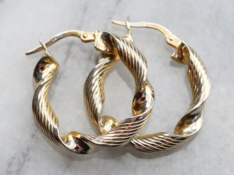 Ladies earrings top brands-Twisted Gold Ribbon Hoop Earrings