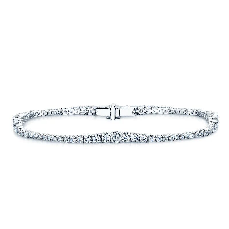 Ladies bracelets stacked styles-18ct White Gold Graduating Diamond Tennis Bracelet