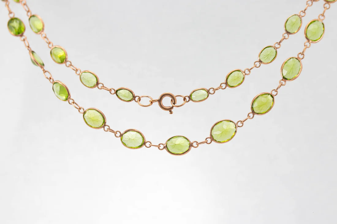 Ladies necklaces collectible pieces-9ct Rose Gold Peridot Graduated Line Necklace