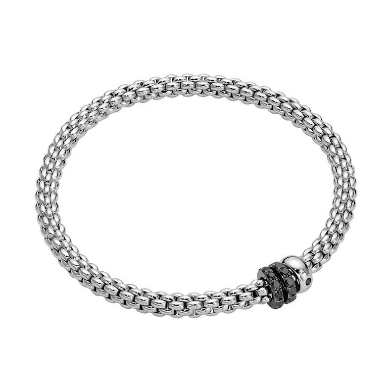 Ladies bracelets budget finds-Flex'it Solo 18ct White Gold Bracelet With Three Black Diamond Rondels