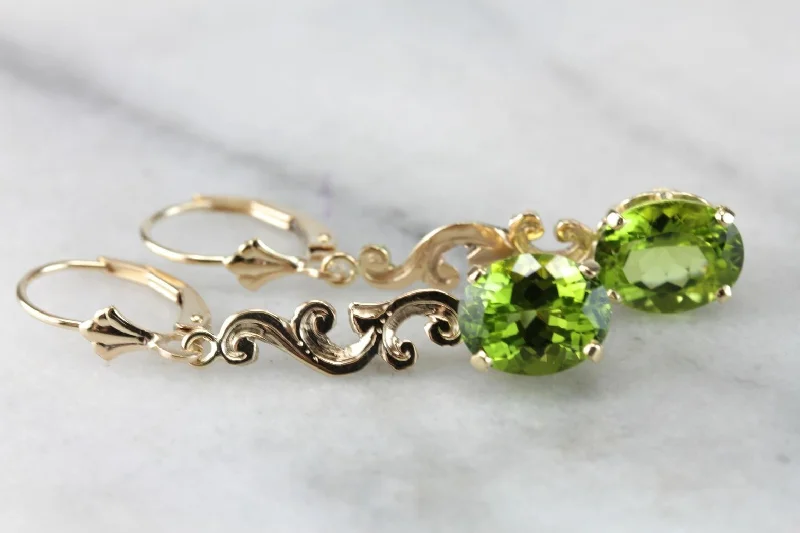 Ladies earrings white gold-Scrolling Bright Green Peridot Drop Earrings