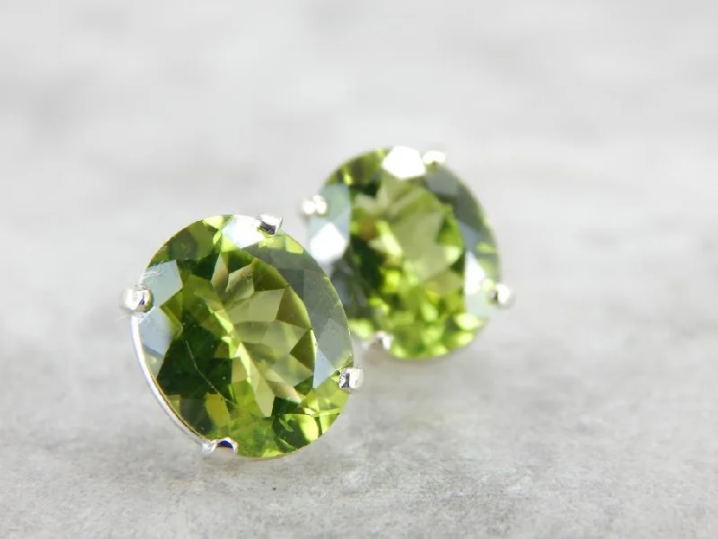 Ladies earrings stud styles-Large Oval Peridot Stud Earrings in White Gold