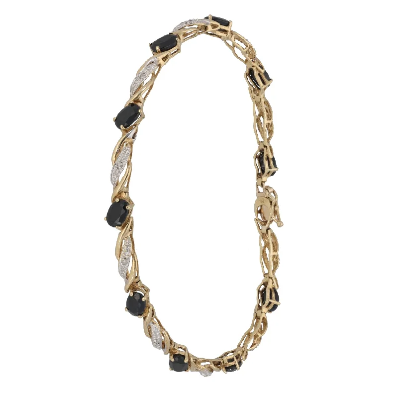 Ladies bracelets unique pieces-9ct Gold Sapphire & 0.05ct Diamond Fancy Stone Set Bracelet