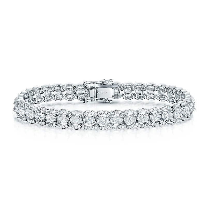 Ladies bracelets vintage appeal-18ct White Gold Oval Cut Diamond Fancy Halo Bracelet