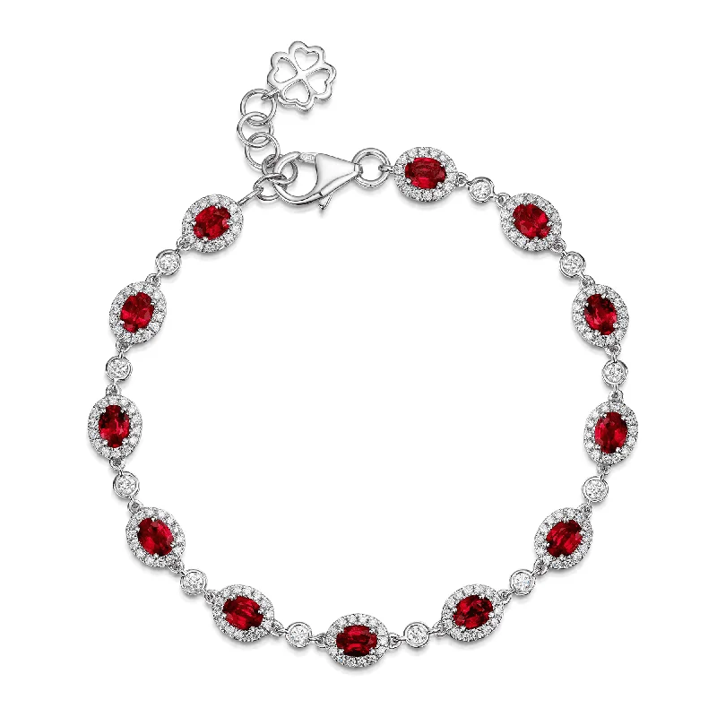 Ladies bracelets titanium options-18ct White Gold Oval Ruby And Diamond Halo Bracelet